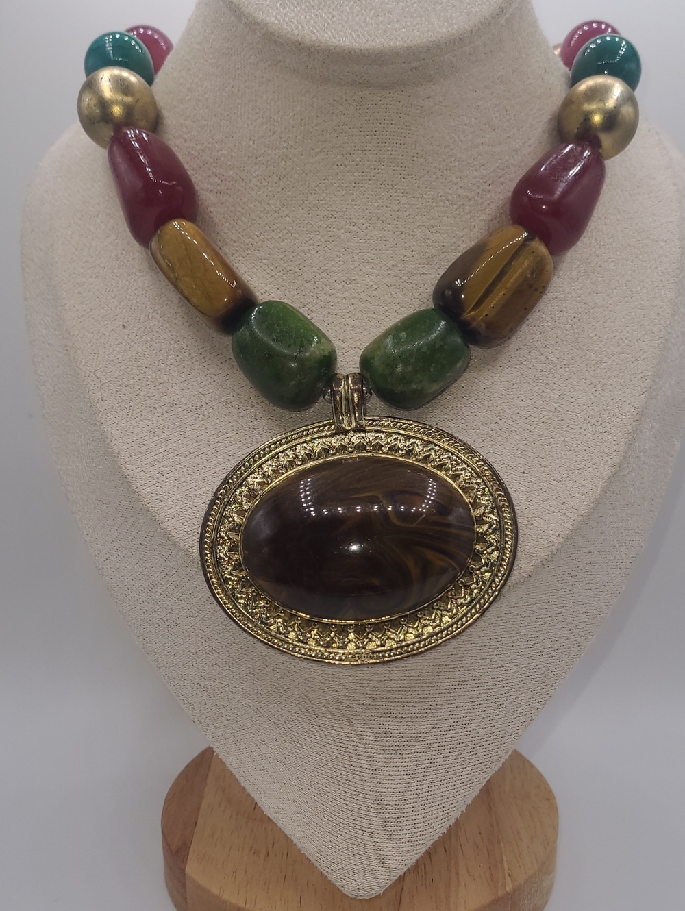 Multicolor Beaded Statement Necklace with Gold Oval Pendant